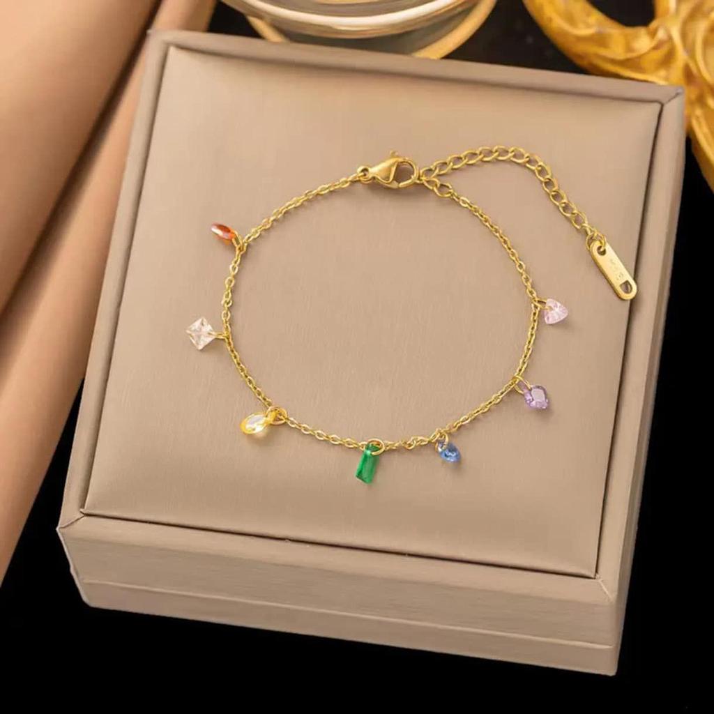 Pulsera de diamantes de colores baño de oro.