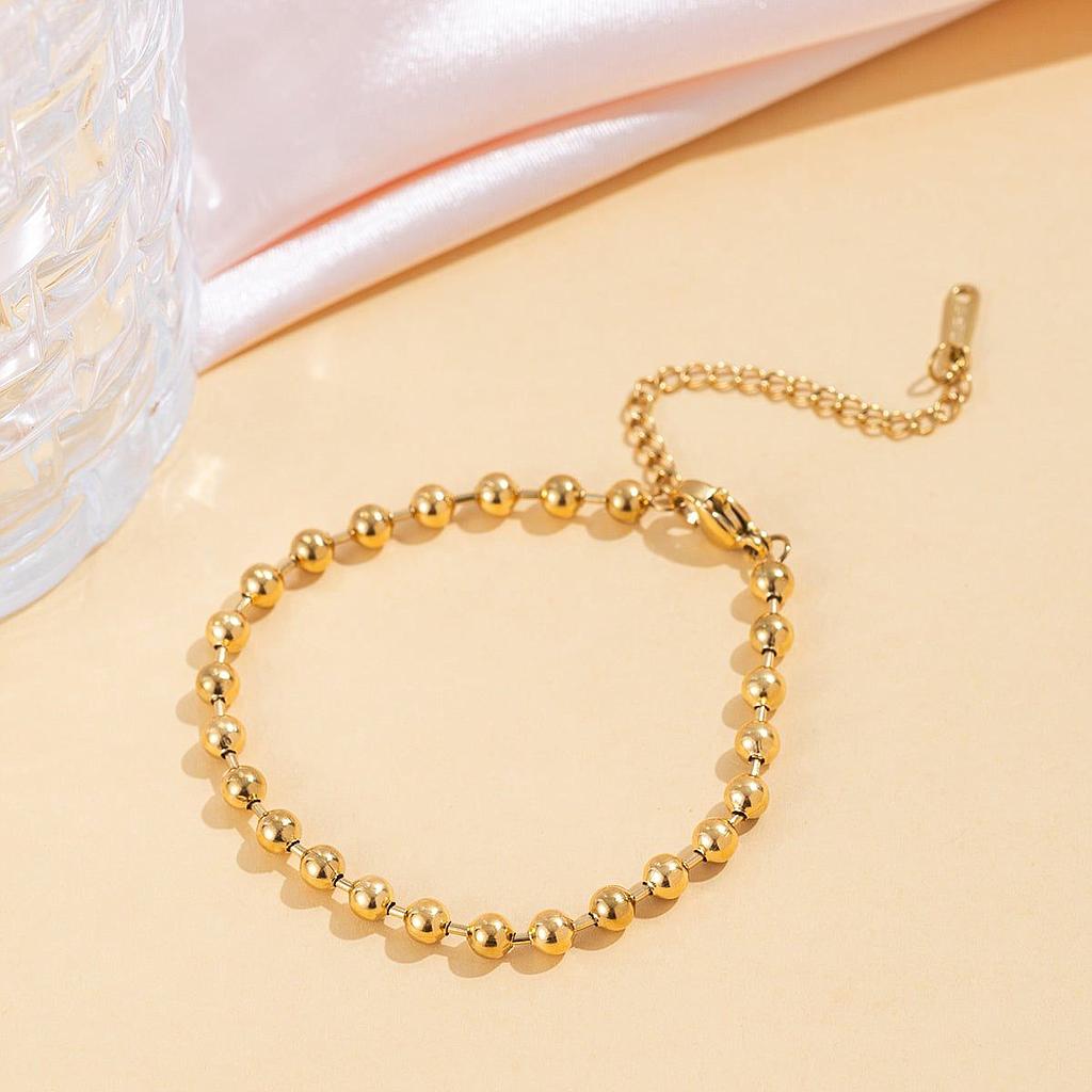 Pulsera de perlitas doradas
