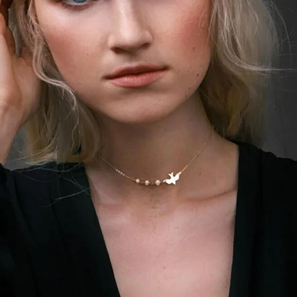 Chocker plateado de golondrina con perlitas